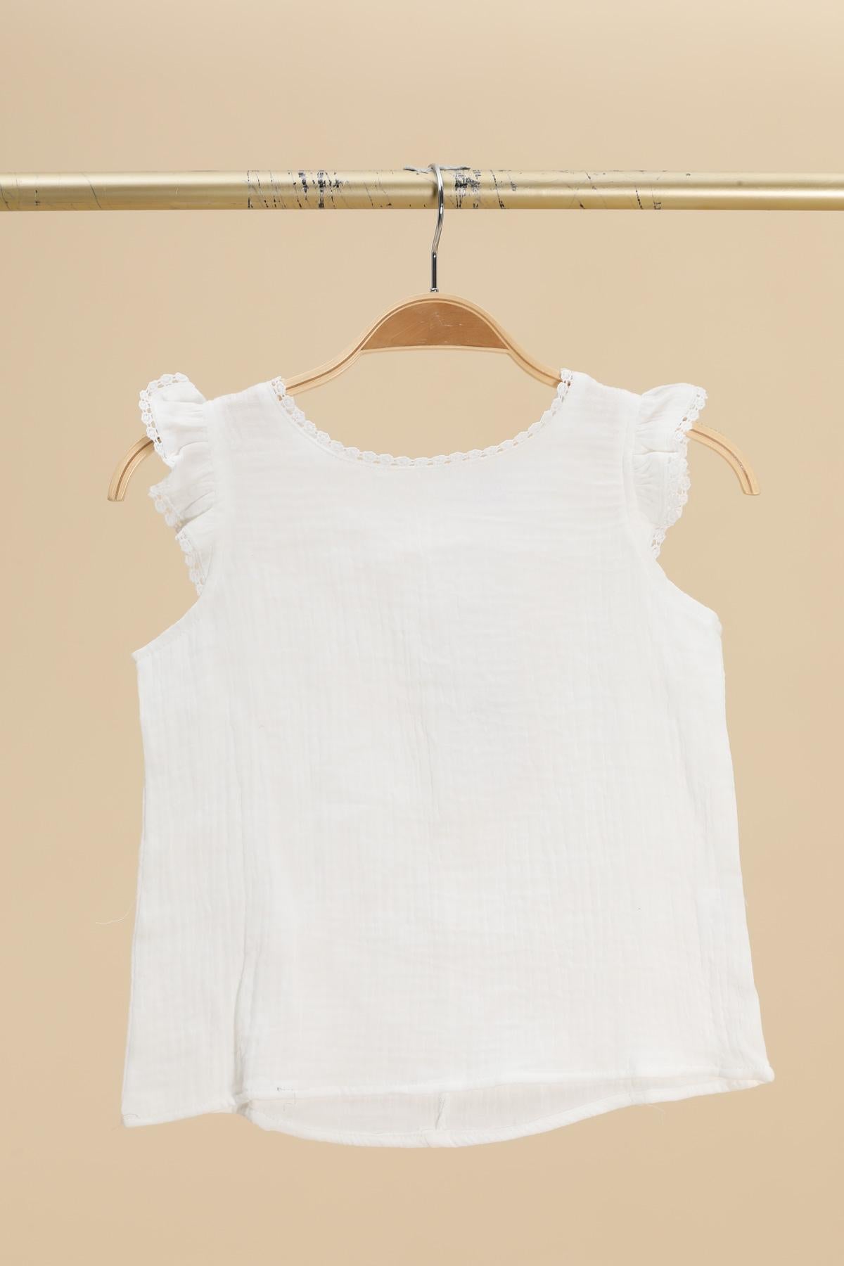 Débardeur col rond manches volantées brodées