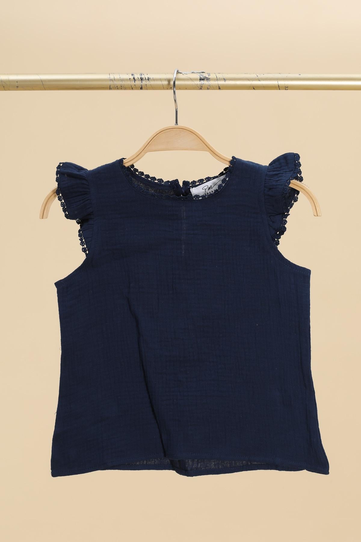 Débardeur col rond manches volantées brodées